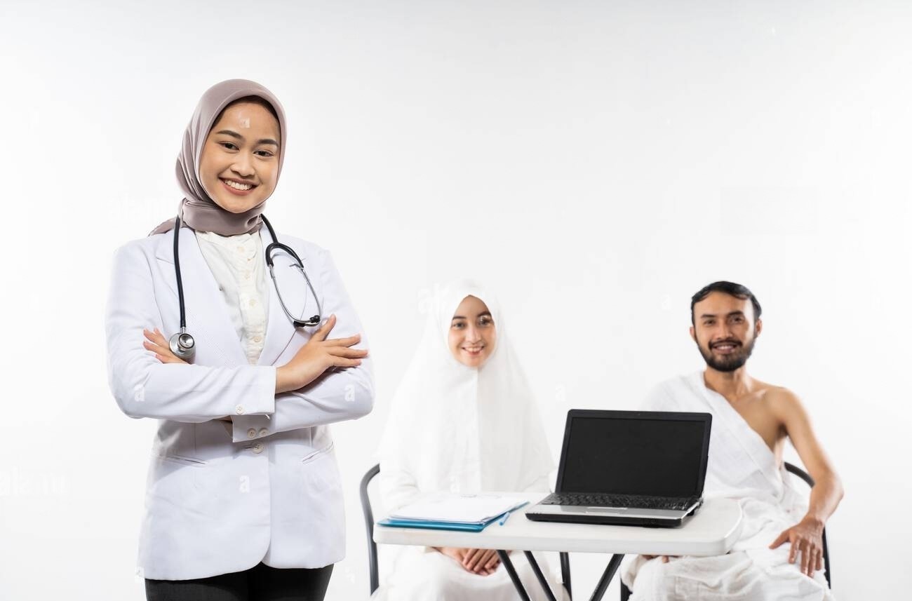 doctor-in-veil-smiling-with-folded-hands